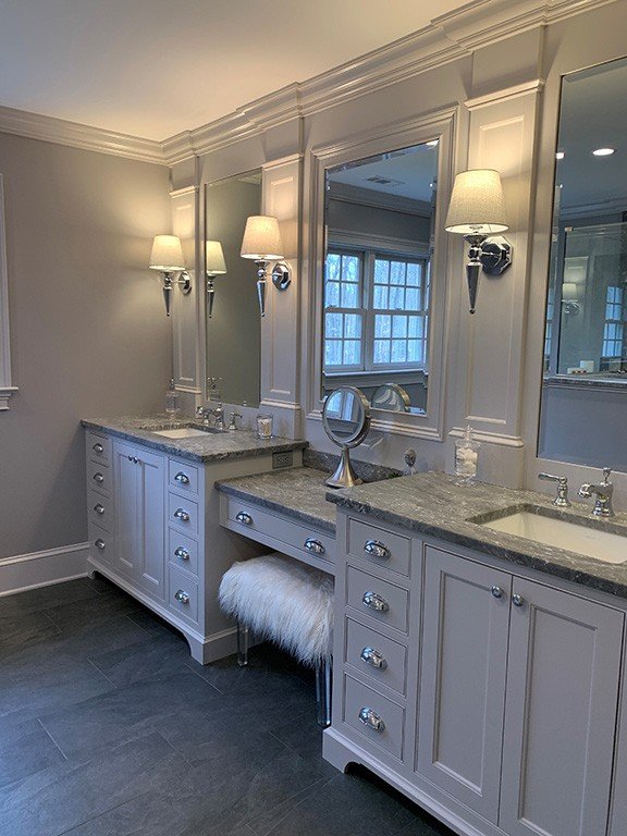 light grey bathroom vanity with silver hardware