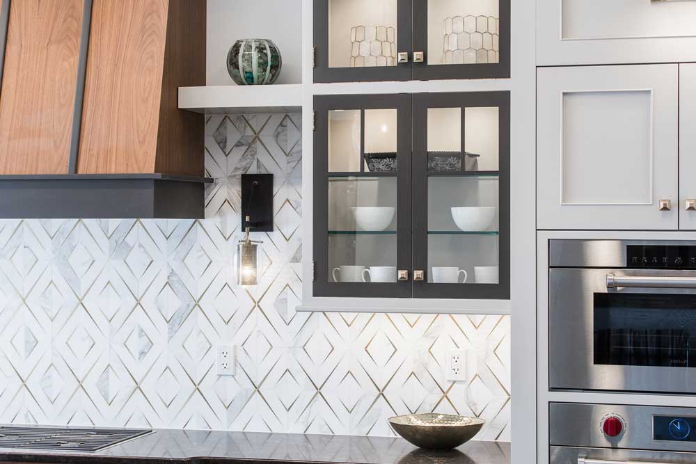 white and gold backsplash tile