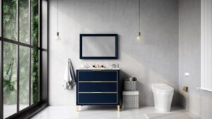 navy blue bathroom vanity with gold fixtures, tankless toilet