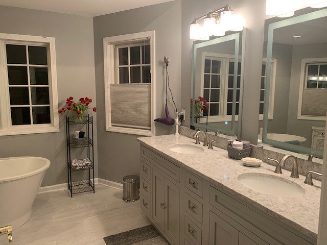 grey bathroom vanity with silver hardware