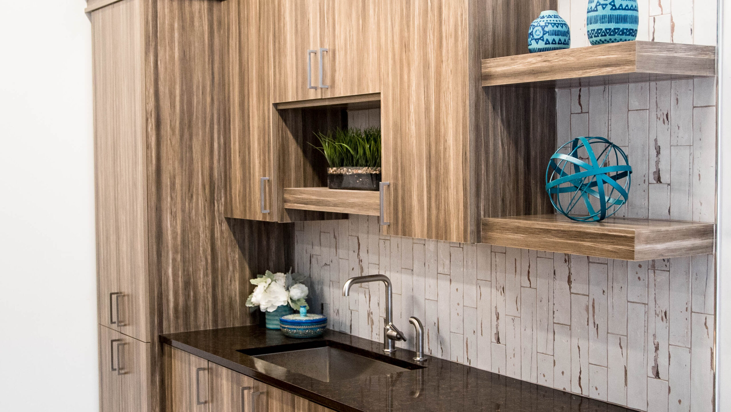 brown kitchen cabinets with silver hardware, silver kitchen faucet