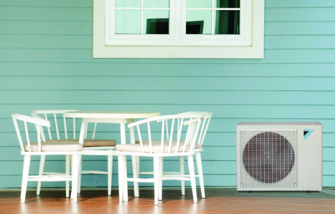 aqua house siding, Daikin unit, table with chairs