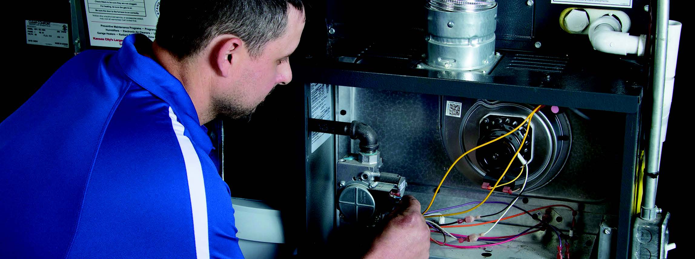 person working on Furnace