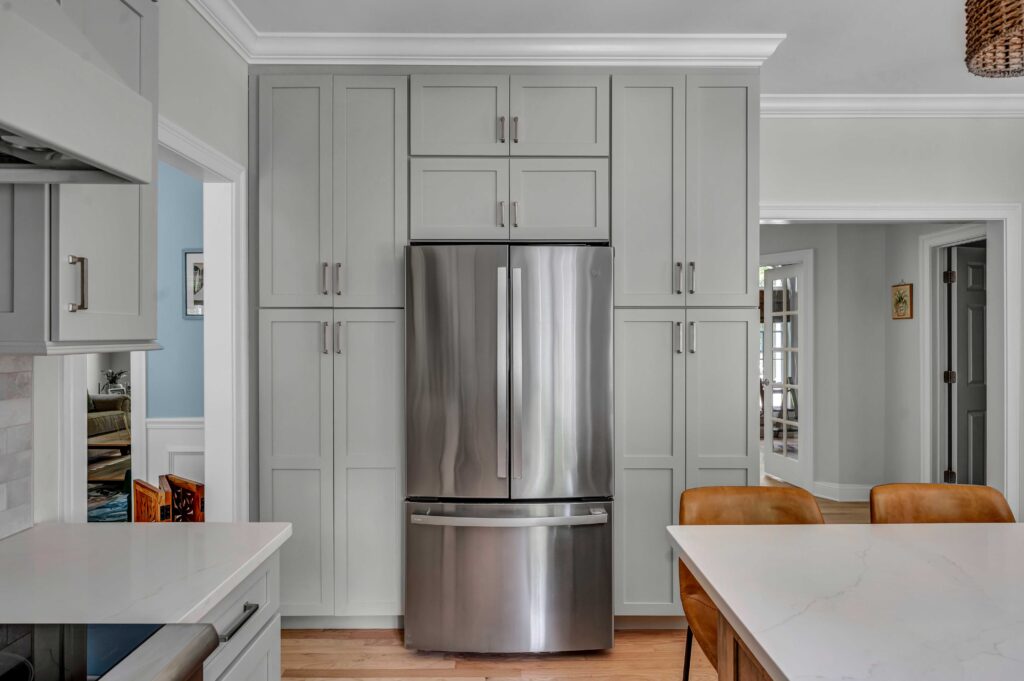cabinets surround refrigerator