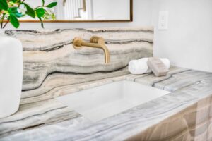 gold wall mounted faucet