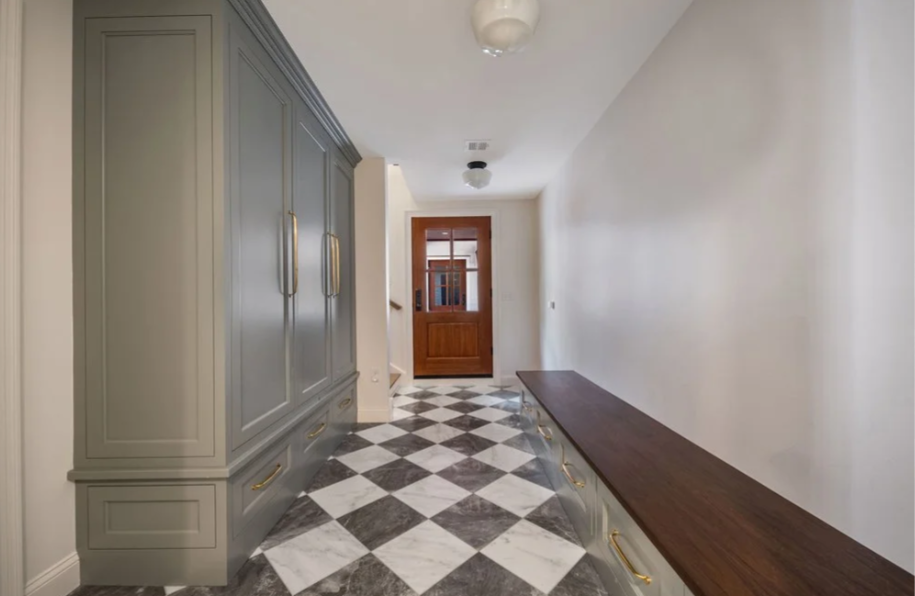 mudroom with checkered tile