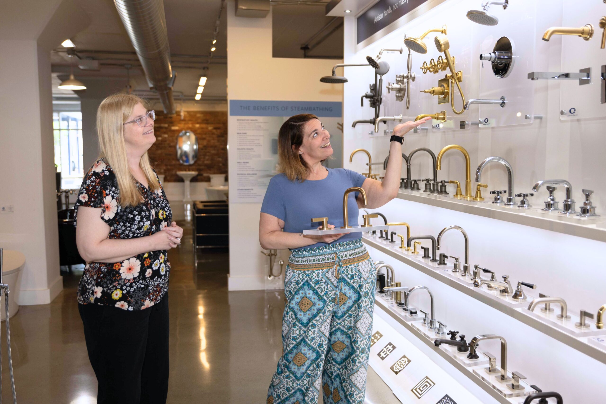 teammates showing a display