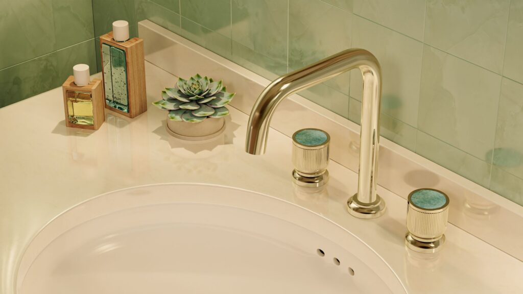 gold bathroom faucet with green accents
